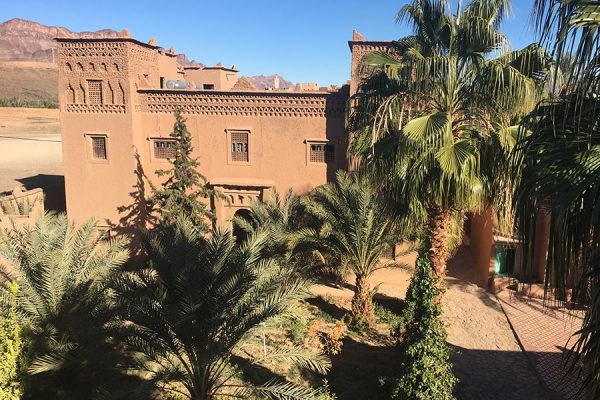 The Kasbah Itrane with palm trees