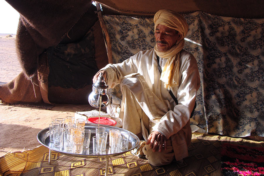 Nomad prepares the "Berber Whiskey", a mint tea